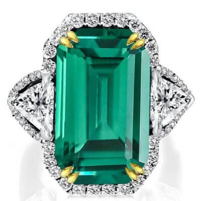 Two Tone Emerald Cut Three Stone Halo Engagement Ring