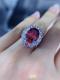 Halo Created Oval Cut Garnet Engagement Rings
